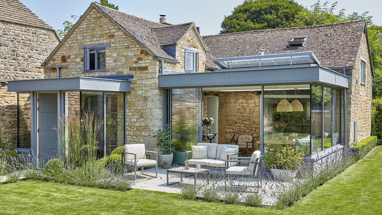 Wrap-around extension with glass roof elements